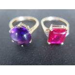 Two 9ct Yellow Gold Rings - one set with amethyst to shoulder - size Q, the other size R - approx 8.