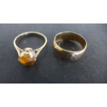 Two 9ct Yellow Gold Rings, one size J in the form on a band,