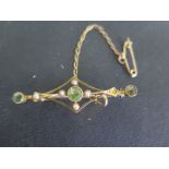 A 15ct Yellow Gold Brooch of Geometric form set with green stones and seed pearls - approx 3 grams