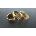 Three 9ct Band Rings - sizes O, P and Q - total weight approximately 11.