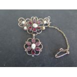 A 19th century 18ct gold garnet and pearl brooch - approx weight 4.