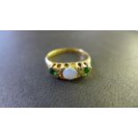 An 18ct Yellow Gold Opal and Emerald and Diamond Ring Size O - approximately 2.
