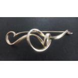 A Georg Jensen silver Brooch of flowing organic form - some light usage wear