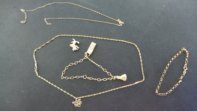 Two 9ct Yellow Gold Bracelets and Two 9ct Necklaces - one broken - the rest good and a loose charm