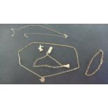 Two 9ct Yellow Gold Bracelets and Two 9ct Necklaces - one broken - the rest good and a loose charm