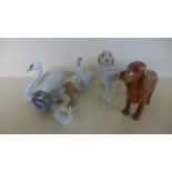 Six items of Royal Copenhagen - items include dog, swan, cockerell,