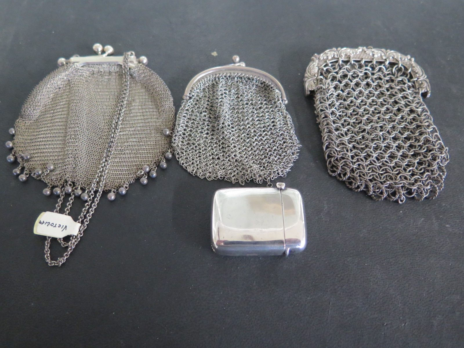 Three chain mail purses - one hallmarked Birmingham 1859 and a silver vesta hallmarked Birmingham - Image 2 of 2