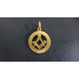 A 9ct Yellow Gold Masonic Pendant - 23 mm wide, approximately 4.