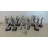 Thirteen silver plated soldier figures, 12 cm tall - three missing bases,