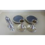 A pair of silver candlesticks, Birmingham 1959, 8 cm tall,