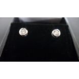 A Pair of Diamond Solitaire Earrings set in 18ct White Gold - in good clean and bright condition