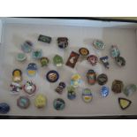 A collection of 33 vintage Butlins badges dating from 1946