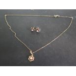 A 9ct Gold Necklace and Earring Set - with Opal and Garnets - in good condition - one earring