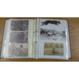 An album containing approximately 210 postcards relating to World War One and a number of News