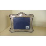A silver photograph frame to take an 11 x 15 cm picture - London 1996 - minor dents - generally