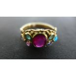 An 18ct Yellow gold Multi-Stone Dearest Ring, stones include diamond, two emeralds, amethyst, ruby,