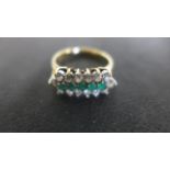 9ct gold ring set with emeralds and white stones, size L, 2.