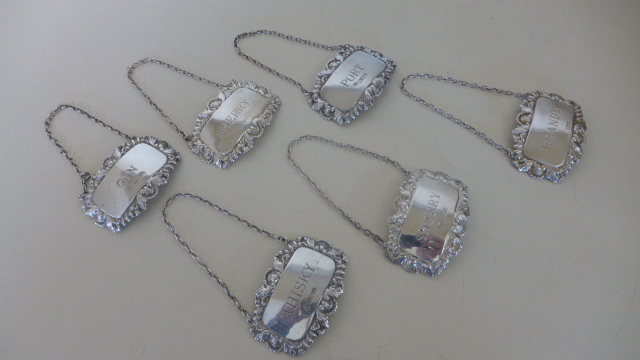 Six silver decanter labels - various dates - total approx weight 2.