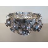 A silver plated punch bowl with a ladle and twelve cups - Height 20cm x Diameter 32cm - some plate