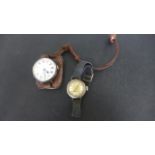 A silver cased trench watch,