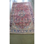 A Hand Knotted Kashan Rug, 2.02m x 1.25m - some damage to sides in middle with sewn repair