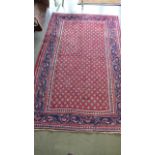 A Hand Knotted Araak Rug, 2.08m x 1.37m - some old stitched repairs, small rips to edges