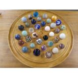 An oversized Solitaire Board with Agate and Glass Markers, 72cm in diameter