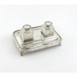 A George III silver inkstand, by John Emes, London 1806, rectangular form, gadroon border, with