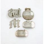 A small mixed lot of modern silver wine labels, comprising: one of shell form, incised 'SHERRY',