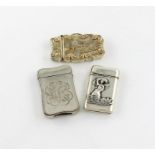 A collection of three American silver vesta cases, comprising: one with a scene of the White House