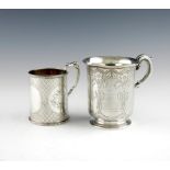 A Victorian silver mug, by The Barnards, London 1863, circular form, scroll handle, engraved and