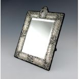 An Edwardian silver dressing table mirror, by The Goldsmiths and Silversmiths Company, London