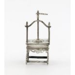 A 19th century Dutch silver miniature press, marked with a Dutch export mark, and a French import