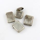 A small collection of four silver vesta cases, rectangular form, three with engraved decoration,