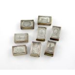 A collection of eight Edwardian silver 'castle-top' matchbox covers, by Levi and Salaman, Birmingham