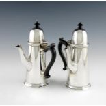 A pair of silver cafe au lait pots, by James Dixon and Sons, Sheffield 1932, tapering circular form,