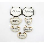 A small collection of seven wine labels, comprising: an enamelled pair, titled 'RATZERSDORF' and '