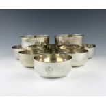 A set of eight regimental silver finger bowls, by Page, Keen and Page, London 1926/7, plain