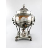 λ A George III old Sheffield plated tea urn, circa 1810, globular form, part-fluted decoration, lion