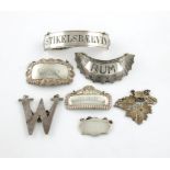 A mixed lot of silver and electroplated wine labels, various designs and titles, including: '