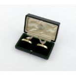 A matched pair of Edwardian silver-gilt menu card holders, one by William Hornby, the other by The