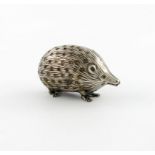 An Edwardian novelty silver porcupine pin cushion, by Adie and Lovekin, Birmingham 1906, modelled in