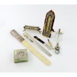 λ A collection of silver desk accessories, comprising: a silver-mounted tortoiseshell thermometer,
