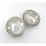 A pair of late-Victorian silver dishes, by Elkington and Co, Birmingham 1891, oval form, part fluted