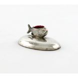 A novelty silver fish pin cushion, by S. Mordan and Co, Chester, marks worn, modelled as a fish,