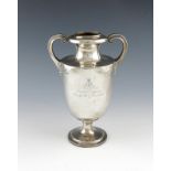 A presentation silver regimental trophy vase, by Lawn and Alder, London 1912, plain vase form,