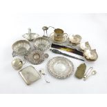 λ A mixed lot of silver items, comprising: a cup and saucer, by E. Hutton, London 1893, fluted