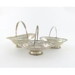 A small collection of three swing-handled baskets, comprising silver items: one by Peter, Ann and