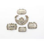 A collection of five antique silver wine labels, comprising: a George IV label, London 1826, incised