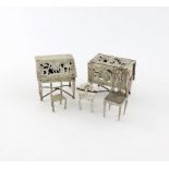 A mixed lot of silver miniature furniture, comprising: a Dutch bureau, with pierced and embossed